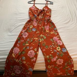 Orange floral romper.